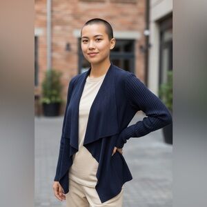 Tommy Hilfiger women’s size XS sweater with faux Suade front in navy blue